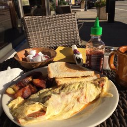 The chorizo and red pepper omelet with grilled home fries.