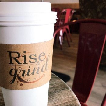 Rise & Grind Cafe - a coffee cup on a table - Cafes Near Me - Syracuse, New York Rise & Grind Cafe - a coffee cup on a table - Cafes Near Me - Syracuse, New York