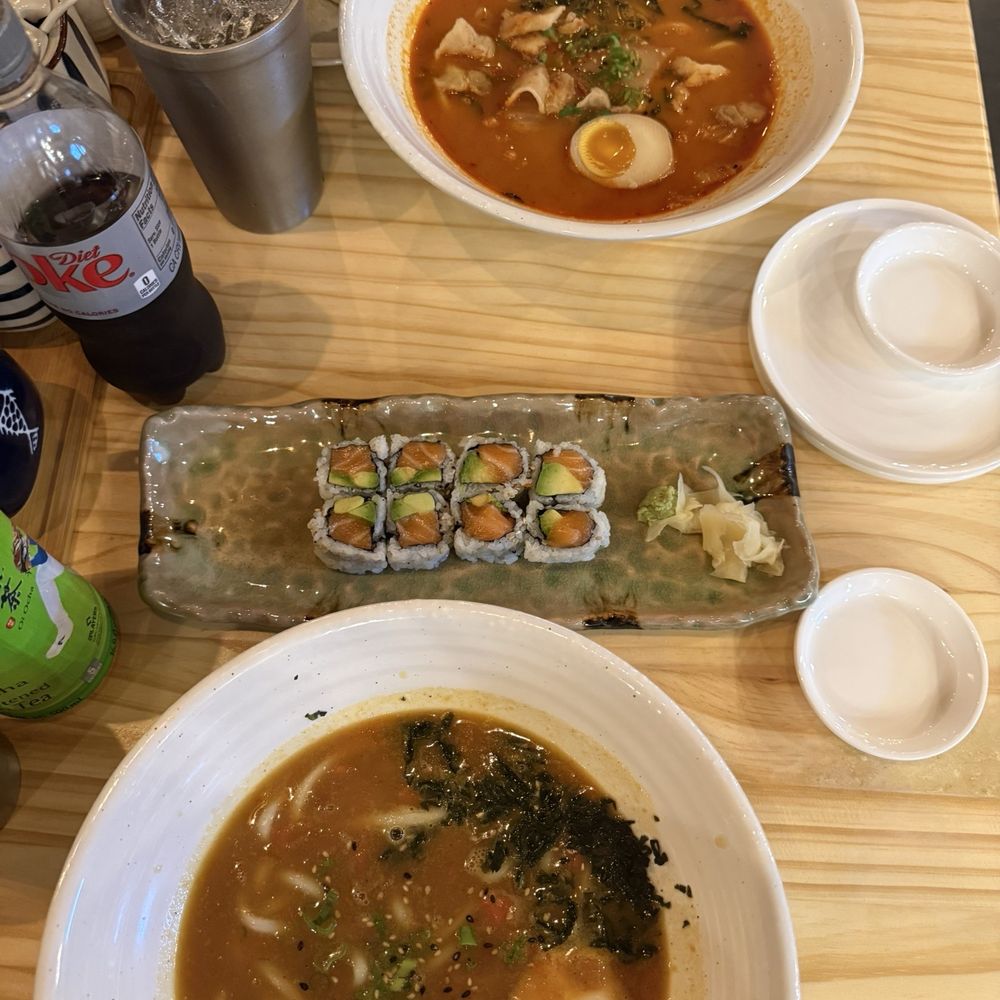 Curry udon, pork kimchi udon, and salmon avocado roll Curry udon, pork kimchi udon, and salmon avocado roll