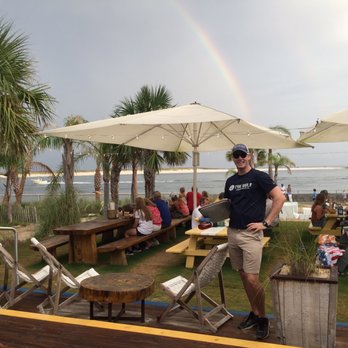 The Gulf - Rainbow over the beach with a friendly staffer posing for the pic - Burgers Near Me - Orange Beach, Alabama The Gulf - Rainbow over the beach with a friendly staffer posing for the pic - Burgers Near Me - Orange Beach, Alabama