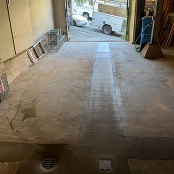 Five Star Plumbing & Rooter - Freshly resurfaced garage floor with improved drainage, ready for action. - Plumbing Near Me - San Francisco, California Five Star Plumbing & Rooter - Freshly resurfaced garage floor with improved drainage, ready for action. - Plumbing Near Me - San Francisco, California