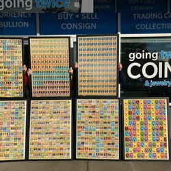 Uncut Pokémon sheets in front of the store.