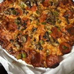 Mr Scrib's Pizza - 12" supreme extra cooked with extra sauce