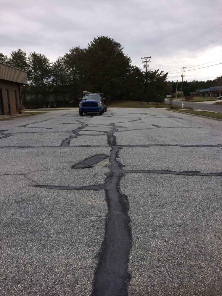 Slide of Advanced Roofing & Paving