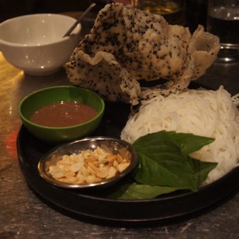 Lunch Lady - Turmeric icelandic cod ($26.00); platter of black sesame rice crackers, crushed peanuts, vermicelli noodles, basil and mam nem - Vietnamese Near Me - Vancouver, British Columbia Lunch Lady - Turmeric icelandic cod ($26.00); platter of black sesame rice crackers, crushed peanuts, vermicelli noodles, basil and mam nem - Vietnamese Near Me - Vancouver, British Columbia
