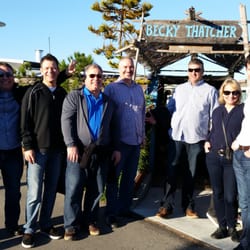 Sausalito Wooden Boat Tour - Walking tour participants pause to pay respect to a local waterfront hero, Joe Tate, in front of his 1890s ark, Becky Thatcher.