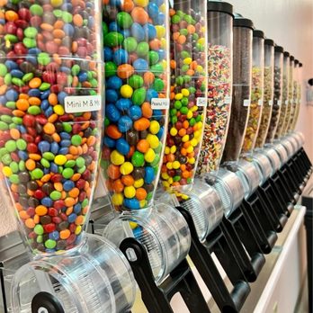 Cuppa Yo Frozen Yogurt - a row of candy dispensers - Ice Cream & Frozen Yogurt Near Me - Buckeye, Arizona Cuppa Yo Frozen Yogurt - a row of candy dispensers - Ice Cream & Frozen Yogurt Near Me - Buckeye, Arizona