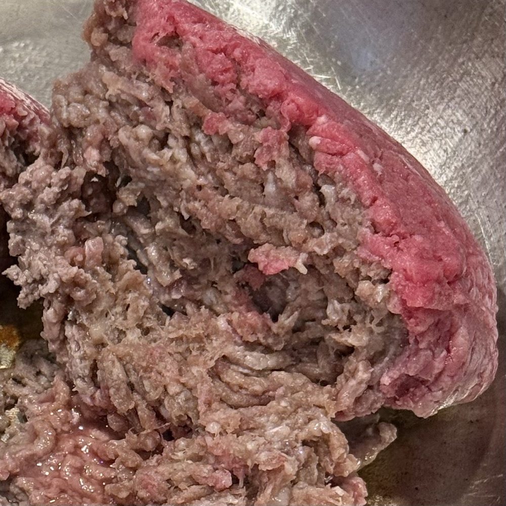 Spoiled beef tucked away in a red food dye fake mustache.