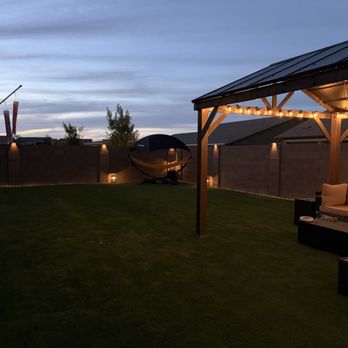De Los Santos Landscaping - Backyard with gazebo and turf - Landscaping Near Me