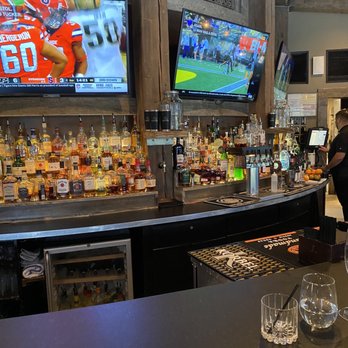 E3 Chophouse - a bar with a large screen tv - Steakhouses Near Me - Steamboat Springs, Colorado