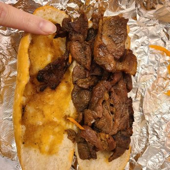 Vietnam Kitchen - This banh mi was $7... That's my finger for scale. - Vietnamese Near Me - Arcadia, California Vietnam Kitchen - This banh mi was $7... That's my finger for scale. - Vietnamese Near Me - Arcadia, California