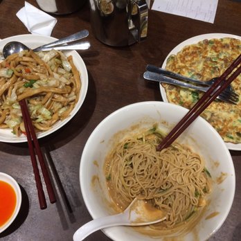 Dinesty Dumpling House - Tan Tan noodles, fried noodles, and egg omelette with pickles. - Chinese Near Me - Vancouver, British Columbia Dinesty Dumpling House - Tan Tan noodles, fried noodles, and egg omelette with pickles. - Chinese Near Me - Vancouver, British Columbia