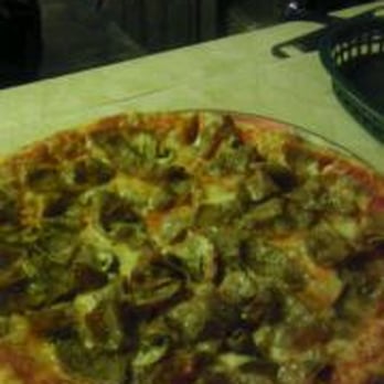 Astor Bar & Grill - Mushroom and sausage bar pie - Dive Bars Near Me - Jersey City, New Jersey Astor Bar & Grill - Mushroom and sausage bar pie - Dive Bars Near Me - Jersey City, New Jersey