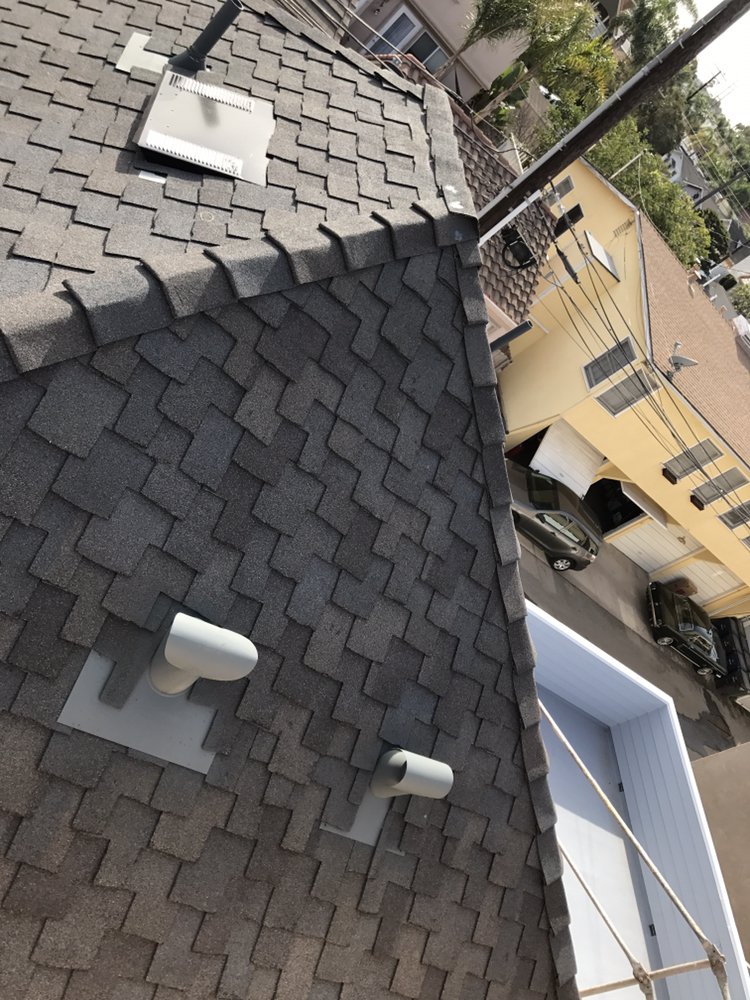 Slide of H&M ROOFING