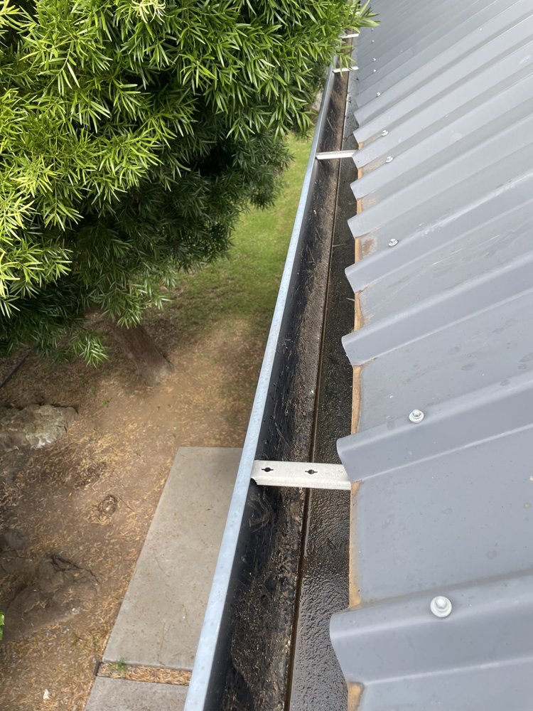 Slide of Ace Roof & Gutter Cleaning