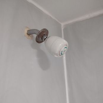 Econo Lodge Biltmore - The bathroom was in awful condition. This was the showerhead, the tub was dirty with a dark stain near the drain. - Hotels Near Me - Asheville, North Carolina