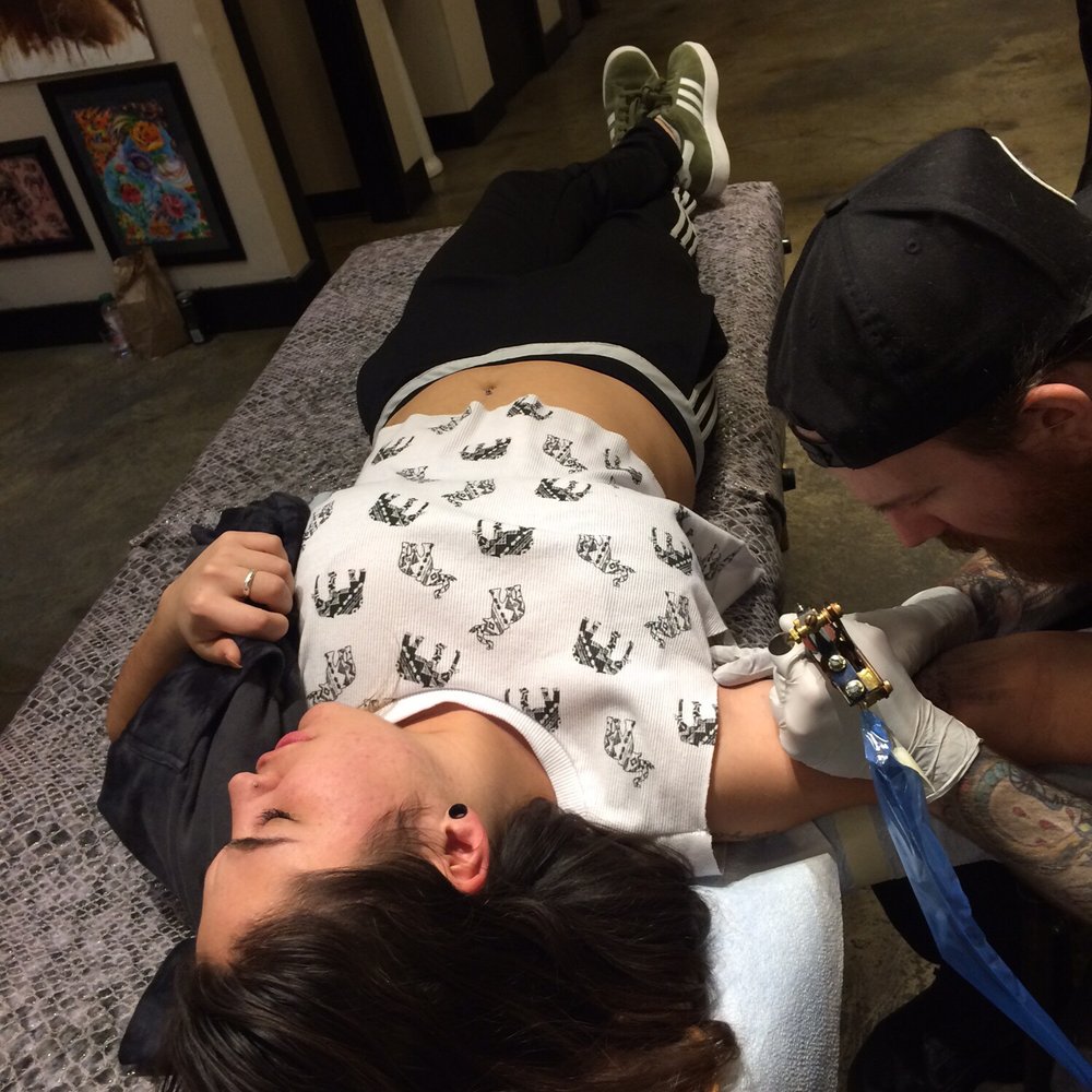 Under the Needle Tattoo - My friend getting a tattoo in her grandpas honor - Tattoo Near Me - Kirkland, Washington Under the Needle Tattoo - My friend getting a tattoo in her grandpas honor - Tattoo Near Me - Kirkland, Washington