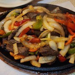 Casa Molina Del Norte - Sizzling hot delicious beef fajita. My favorite!