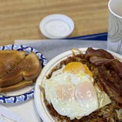 Crown Burgers - More hashbrowns than I know what to do with, lightly buttered toast and semi-crispy bacon.