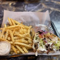 Halal Khorasan kabob & Gyro - Delicious beef/lamb sandwich, spicy and a side of fries! Love the extra sauce they give!