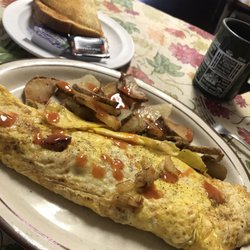 Country Pleasures - Denver omelette with toast and a side of American fries.