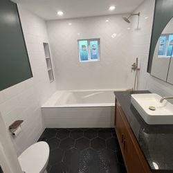 Scott Building Group - Full bath remodel. Lots of tile! Subway tiles, herringbone, and hexagon.
