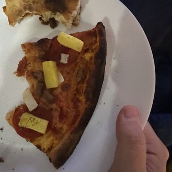 Fratelli's Pizza and Cafe - Burned pizza. - Pizza Near Me - Wesley Chapel, Florida Fratelli's Pizza and Cafe - Burned pizza. - Pizza Near Me - Wesley Chapel, Florida