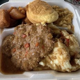 Hamburger steak mashed potatoes, Lima beans and candies yams with corn bread