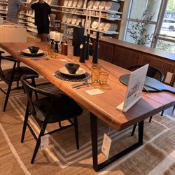 Crate & Barrel - I got the small@92 inches. Raw edge Acacia. Seats 8... ordered matching bench separate