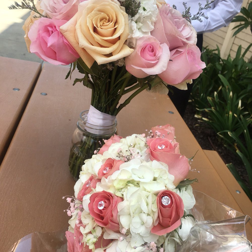 Flowers By Milan - Milan bouquet is the one in the vase. Honestly it looks like they picked the flowers from their garden and just bunched them up. Horrible. - Wedding Planning Near Me - Santa Ana, California Flowers By Milan - Milan bouquet is the one in the vase. Honestly it looks like they picked the flowers from their garden and just bunched them up. Horrible. - Wedding Planning Near Me - Santa Ana, California