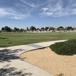 John Lyons Park - Walking path at perimeter of well manicured lawn