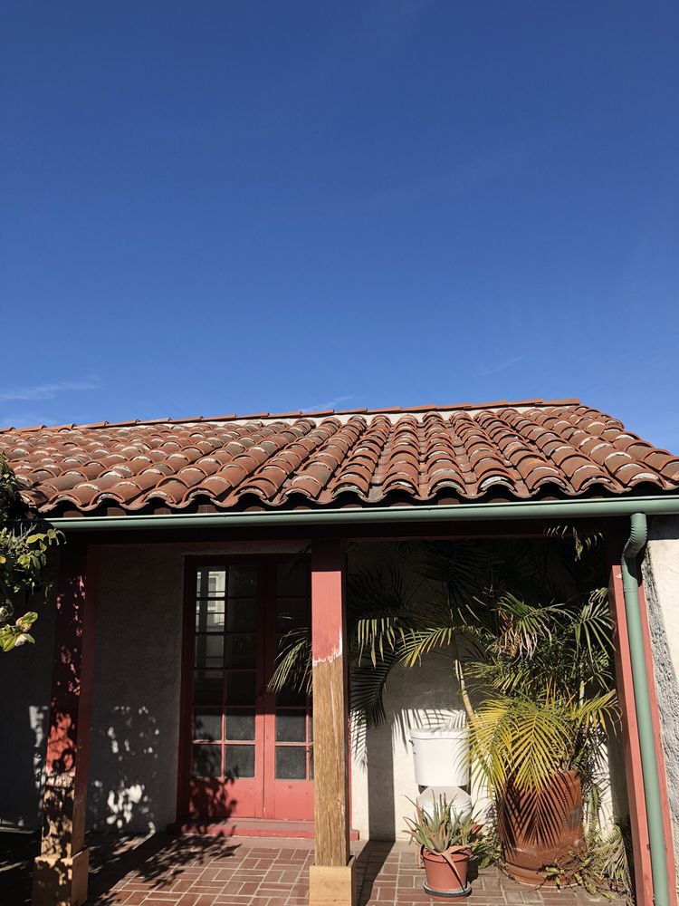 Slide of Eric's Roofing