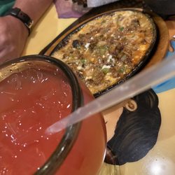 Potrillos Taqueria & Neveria - Strawberry Margarita and chorizo queso