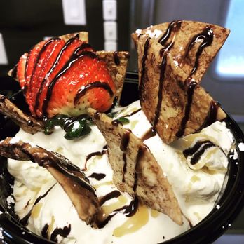Swamp Religion - Ice cream nachos- Vanilla bean ice cream, cinnamon and sugar tortilla chips, sliced  strawberry topped with caramel and chocolate syrup. - Burgers Near Me - Gainesville, Florida