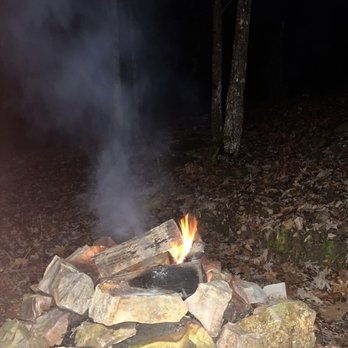 Parker Creek Bend Cabins - The fire pit behind our cabin - Vacation Rentals Near Me - Murfreesboro, Arkansas