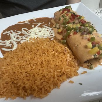 La Esquina Mexican Cafe - Chipotle chimichanga with mango pico and rice and beans - Mexican Near Me - Jackson, Michigan