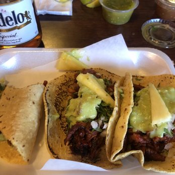 Taco Bar - These are Pastor tacos and with a nice cold modelo to take it down - Mexican Near Me - San Marcos, California Taco Bar - These are Pastor tacos and with a nice cold modelo to take it down - Mexican Near Me - San Marcos, California
