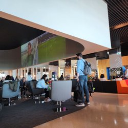 ANA Lounge - Seating, giant screens