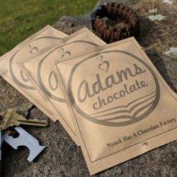 Adams Chocolate - Ingredients:
85% Organic Cacao Beans
15% Organic Cane Sugar 

Nyack has a Chocolate Factory