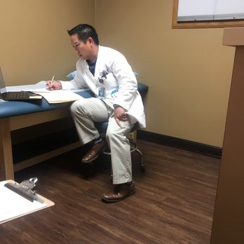 Coastal Pulmonary Associates - Dr. Hsing taking notes during an exam. - Pulmonologist Near Me - Vista, California Coastal Pulmonary Associates - Dr. Hsing taking notes during an exam. - Pulmonologist Near Me - Vista, California