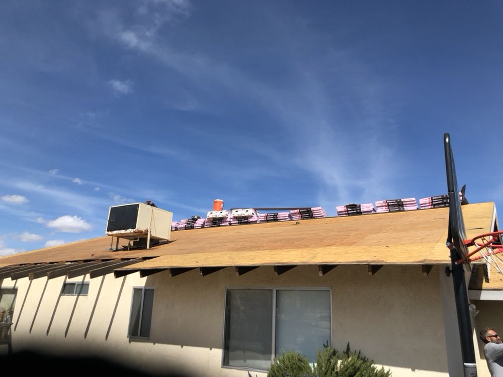 Slide of AMG Roofing