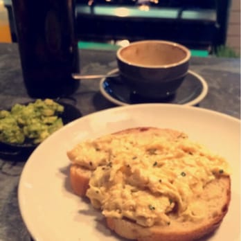 Ozone Coffee - Scrambled eggs, side of avocado and a cappuccino sitting at the counter - Coffee & Tea Near Me - London, XGL