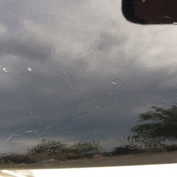 TNT Window Tinting - Front lip of hood. - Auto Detailing Near Me - Middleton, Wisconsin
