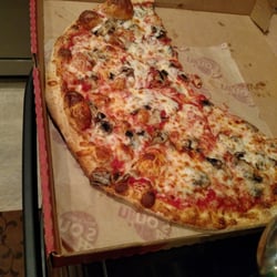 Cuzino's Pizza & Pasta - Half the pizza before all is gone...