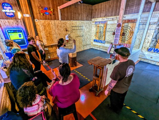 Competitive. Safe. Fun. - Competitive.
The sport of throwing battle axes is believed to have originated in Europe. The modern day version of these contests is called 'urban axe throwing' and appeals equally to both men and women.

Safe.
Safety is our main priority. Our team of professional Axe Coaches are constantly watchful. They will coach you along the way to make sure you learn the basics of safe axe throwing.

Fun.
Axe throwing is all the rage right now, and it’s fun for everyone - men, women, young, and old, everyone can throw an axe! All the fun in axe throwing is it’s all in your form, not your strength.