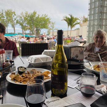 Snappers Turtle Bay Cafe - a table full of food and wine - Burgers Near Me - Spirit Lake, Iowa