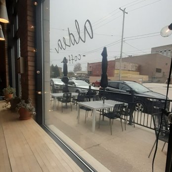 Aldea Coffee - High top bar overlooking outdoor patio. - Coffee & Tea Near Me - Muskegon, Michigan