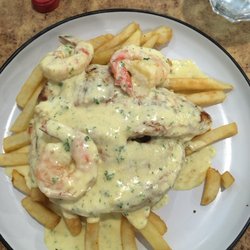 Simon's Coffee Lounge & Restaurant - Surf and turf $13 Great environment and service? Priceless