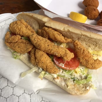 Shrimp N Stuff - Catfish Po-Boy: very tasty but the hoagie split half way through and made it difficult to eat. - Seafood Near Me - Galveston, Texas Shrimp N Stuff - Catfish Po-Boy: very tasty but the hoagie split half way through and made it difficult to eat. - Seafood Near Me - Galveston, Texas