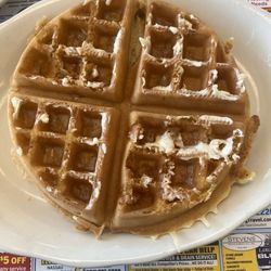 Coram Diner - Waffles at the corn diner with cheesy eggs, bacon, sausage, and and ham excellent place to come and eat the food is absolutely delicious.